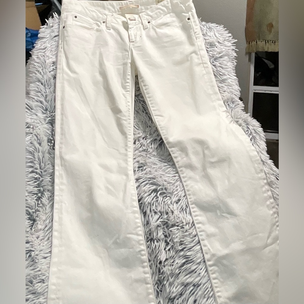 Gap cream colored low rise boot cut jeans